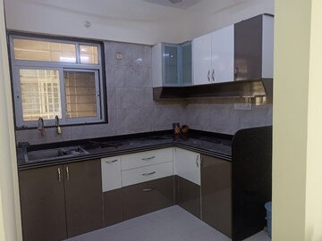 Kitchen in 2 BHK Apartment at Millennium Acropolis, Wakad – for Rent