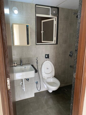 Bathroom in 3 BHK Apartment at Puravankara Silversands, Mundhwa – for Rent
