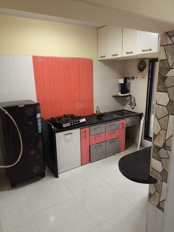Kitchen in 2 BHK Apartment at Swarna Apartments, Mira Road – for Rent