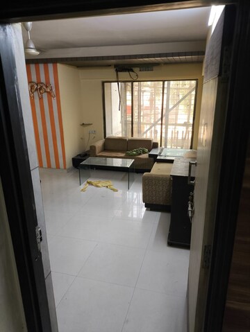 Living Room in 2 BHK Apartment at Swarna Apartments, Mira Road – for Rent