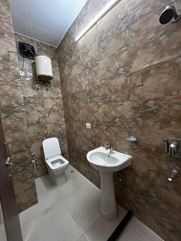 Bathroom in 3.5 BHK Builder Floor at 4 Marla, Sector 10a – for Sale
