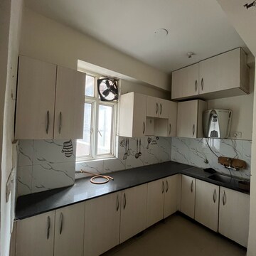 Kitchen in 2 BHK Apartment at Supertech Cape Town, Sector 74 – for Rent