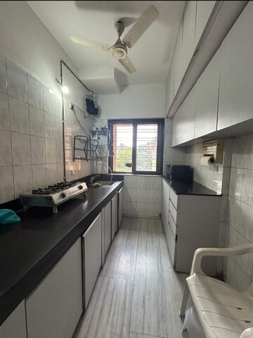 Kitchen in 2 BHK Apartment at Raheja Gardens, Wanwadi – for Sale