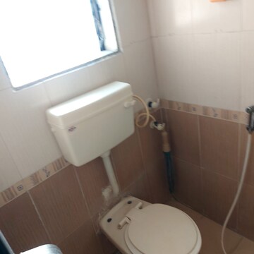 Bathroom in 2 BHK Apartment at Dheeraj Solitaire, Malad West – for Rent