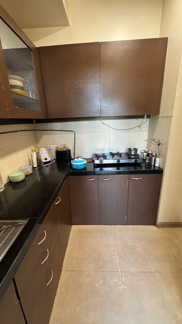 Kitchen in 2 BHK Apartment at Runwal Nirvana, Parel – for Rent