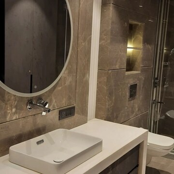 Bathroom in 3.5 BHK Apartment at Ambience Island Lagoon, Sector 24 – for Sale