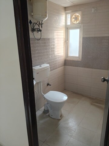 Bathroom in 2 BHK Apartment at Signature Global Orchard Avenue, Sector 93 – for Rent