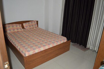 Bedroom in 2 BHK Apartment at Chandrarang Capital Tower, Wakad – for Rent
