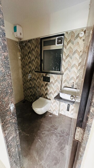 Bathroom in 2 BHK Apartment at Veena Smart Homes, Kandivali West – for Sale