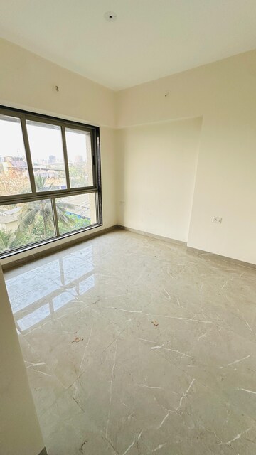 Room in 2 BHK Apartment at Veena Smart Homes, Kandivali West – for Sale