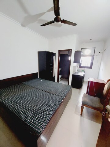 Bedroom in Studio Apartment at Hanumant Bollywood Heights-2, Dhakoli Village – for Rent