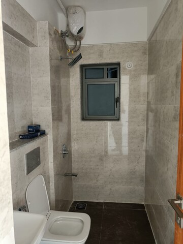 Bathroom in 1 BHK Apartment at Dynamix Avanya, Dahisar East – for Rent