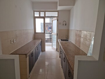 Kitchen in 3 BHK Apartment at GH-7 Crossings Republik, Vijay Nagar – for Sale