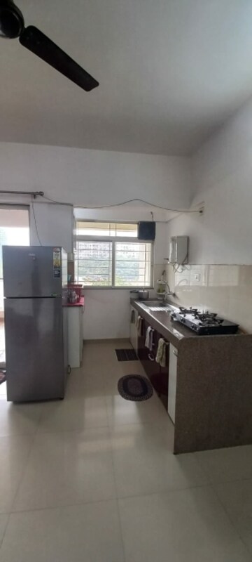 Kitchen in 1 BHK Apartment at Gera Park View, Kharadi – for Sale