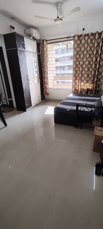 Living Room in 1 BHK Apartment at Mehta Amrut Pearl, Kalyan West – for Sale