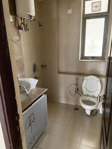 Bathroom in 3 BHK Apartment at Unitech Uniworld Gardens 2, Sector 47 – for Rent
