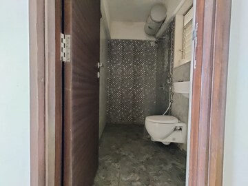Bathroom in 2 BHK Apartment at Ani Anu Sri Balaji Enclave, Malad West – for Sale