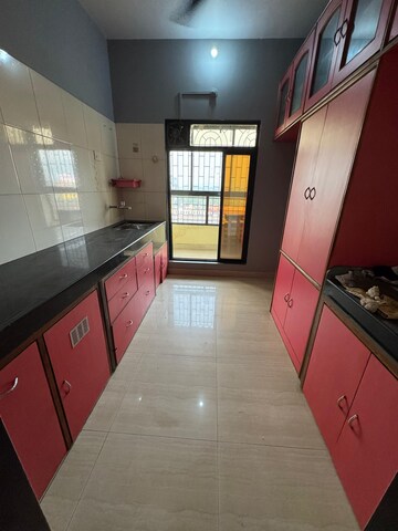 Kitchen in 2 BHK Apartment at City Park CHS, Khanda Colony – for Rent
