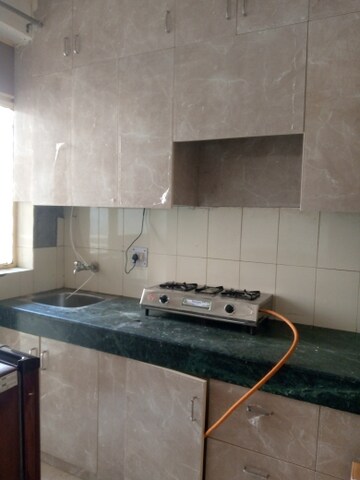 Kitchen in 2 BHK Apartment at Conscient Habitat, Sector 99a – for Rent