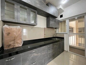 Kitchen in 2 BHK Apartment at Godrej Greens, Undri – for Rent