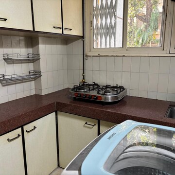 Kitchen in 3 BHK Apartment at Dignity Apartments, Seven Bunglow – for Rent