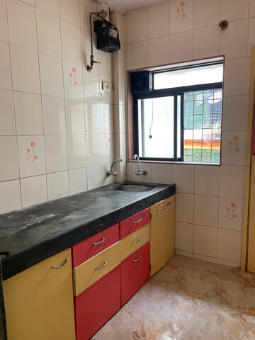 Kitchen in 2 BHK Apartment at Nimbeshwar Chs, Vichumbe – for Rent