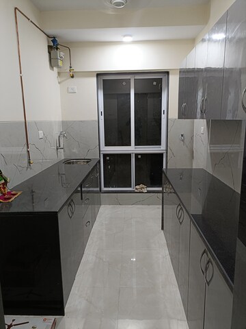 Kitchen in 2 BHK Apartment at Sahyog Oshi, Oshiwara – for Rent