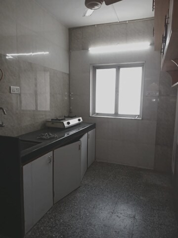 Kitchen in 2 BHK Apartment at Riddhi Tower, Malad East – for Rent
