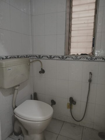 Bathroom in 2 BHK Apartment at Riddhi Tower, Malad East – for Rent