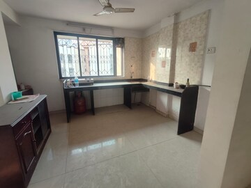 Kitchen in 3 BHK Penthouse at Cosmos Park, Ghodbunder Road – for Sale