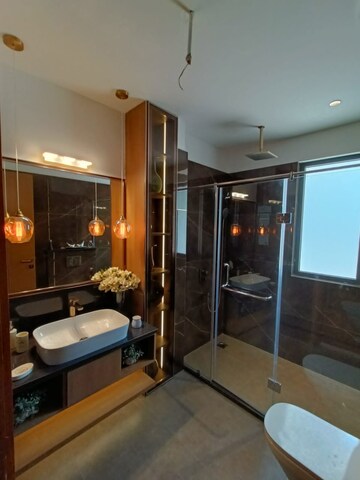 Bathroom in 3.5 BHK Apartment at Ambience Island Lagoon, Sector 24 – for Sale