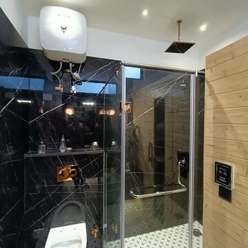 Bathroom in 5 BHK Apartment at Ambience Island Lagoon, Sector 24 – for Sale