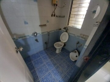 Bathroom in 2.5 BHK Apartment at Garden Tower, Kandivali East – for Rent