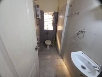 Bathroom in 2.5 BHK Apartment at Garden Tower, Kandivali East – for Rent