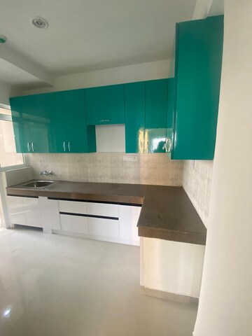 Kitchen in 2 BHK Apartment at ATS Allure, Sector 22d Yamuna Expressway – for Rent