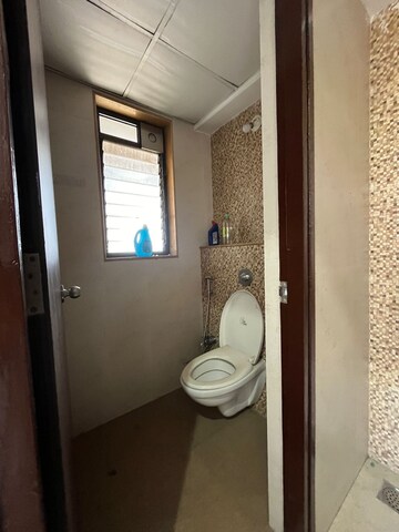 Bathroom in 1 BHK Apartment at Lodha Lakeshore Greens, Dombivli East – for Rent