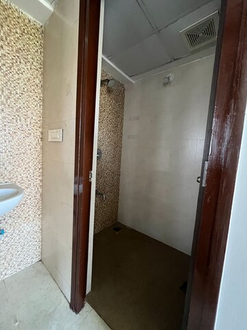 Bathroom in 1 BHK Apartment at Lodha Lakeshore Greens, Dombivli East – for Rent