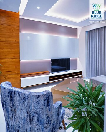 Living Room in 3 BHK Apartment at Motia Blue Ridge, Dhakoli Village – for Sale