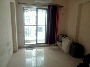 Room in 2 BHK Apartment at DB Orchid Ozone, Dahisar East – for Rent