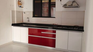 Kitchen in 2 BHK Apartment at Gulmohar Queenstown, Kharadi – for Sale