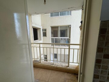 Balcony in 2 BHK Apartment at Godrej Woodsman Estate, Hebbal – for Rent