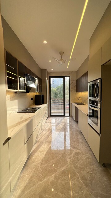 Kitchen in 4 BHK Builder Floor at Ansal Sushant Lok I, Sector 43 – for Rent