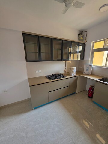 Kitchen in 2 BHK Apartment at Hiranandani Delanna, Ghodbunder Road – for Rent