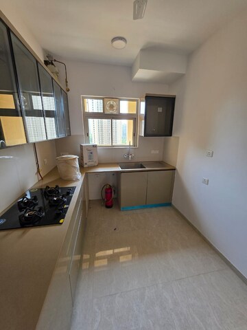 Kitchen in 2 BHK Apartment at Hiranandani Delanna, Ghodbunder Road – for Rent