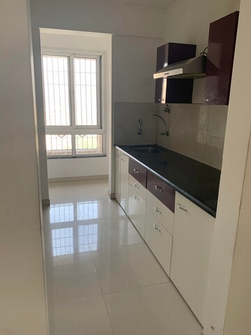 Kitchen in 2 BHK Apartment at Puranik Rumah Bali, Ghodbunder Road – for Rent