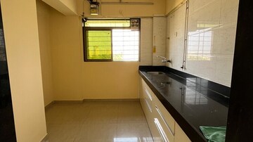 Kitchen in 2 BHK Apartment at Cosmos Park, Ghodbunder Road – for Rent