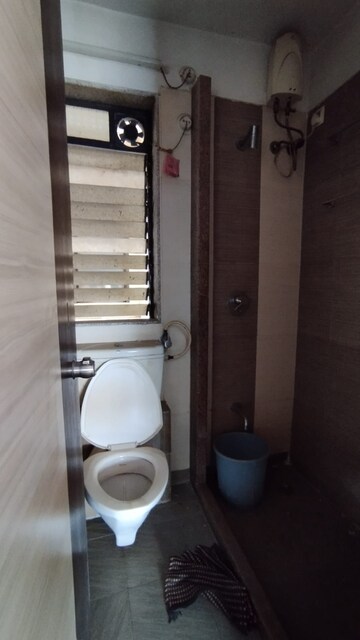 Bathroom in 2 BHK Apartment at Mohan Pride, Kalyan West – for Rent