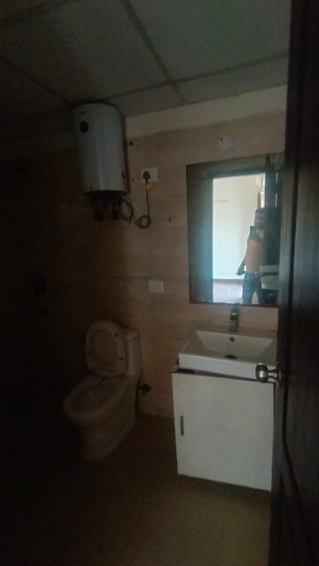 Bathroom in 2 BHK Apartment at Mahagun Moderne, Sector 78 – for Sale