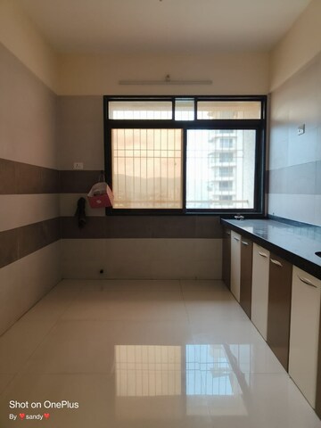 Kitchen in 2 BHK Apartment at Gami Reagan, Ghansoli – for Sale