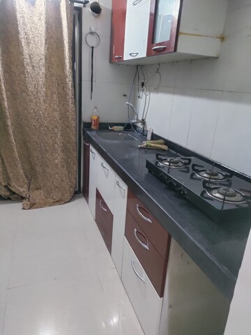 Kitchen in 1.5 BHK Apartment at Dheeraj Jade Residences, Wagholi – for Rent